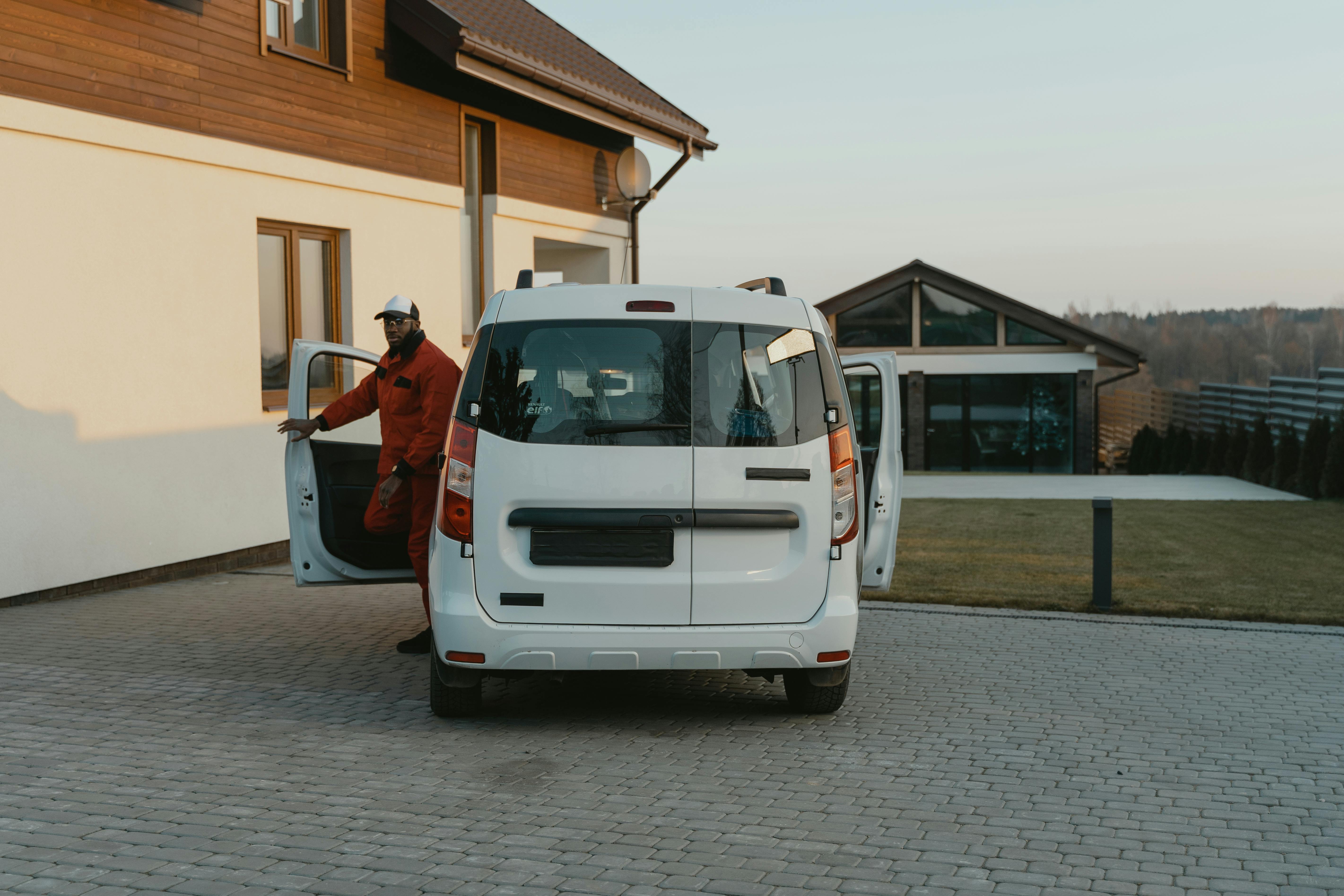 Garage Doors Plus service technician with professional van in Olivehurst, CA